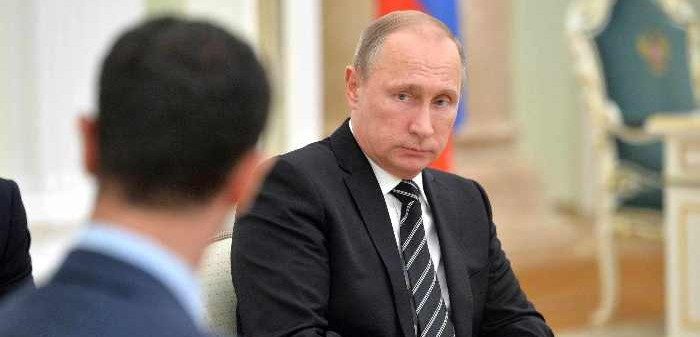 President Vladimir Putin meets with Syrian President Bashar Al-Assad, Moscow, Russia, Oct. 20, 2015. Demotix Live News/Demotix/Corbis