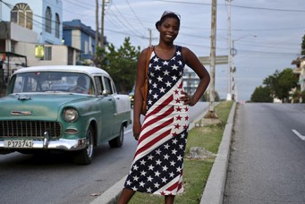 Cuban woman poses wearing an American flag dress, Havana, Aug. 4, 2015. Enrique de la Osa/Reuters/Corbis