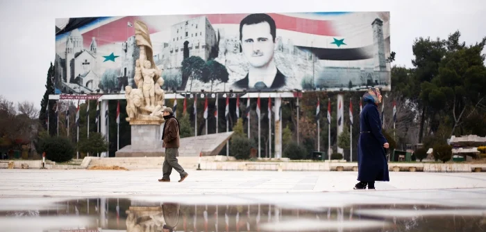 A billboard depicting Syria's President Bashar Al-Assad in the government controlled area of Aleppo, Syria, Dec. 17, 2016. Omar Sanadiki/Reuters