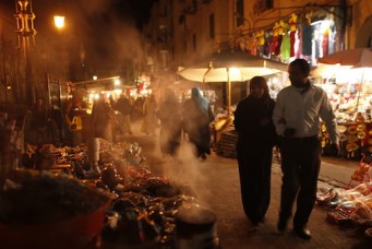 A couple strolls through a market, Cairo, Dec. 15, 2012. Khaled Abdullah/ Reuters