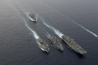 U.S. Navy ships steaming in formation during a drill in the South China Sea, Oct. 13, 2016. Will Gaskill/United States Navy