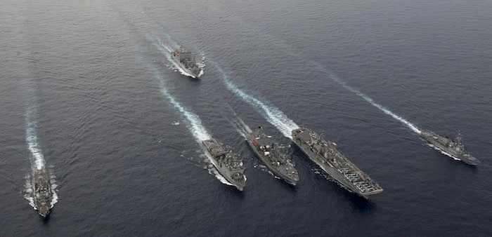 U.S. Navy ships steaming in formation during a drill in the South China Sea, Oct. 13, 2016. Will Gaskill/United States Navy