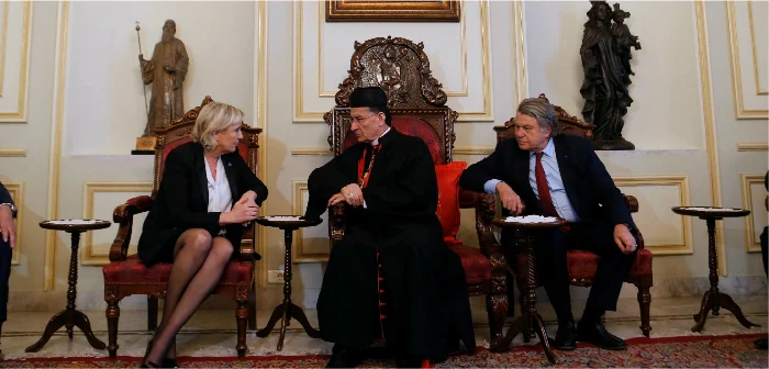 Marine Le Pen, France's National Front (FN) leader and candidate for the 2017 presidential elections, with Cardinal Bechara Boutros Rai of Lebanon, the Maronite Patriarch of Antioch and the Whole Levant, and French deputy Gilbert Collard in Bkerke, north of Beirut, Feb. 21, 2017. Mohamed Azakir/Reuters