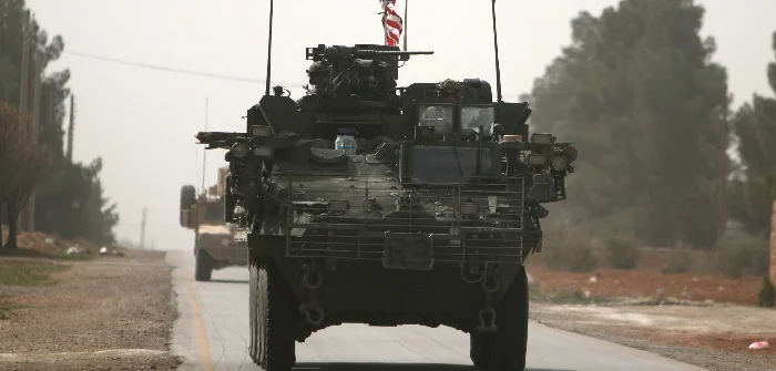 American army vehicles drive north of Manbij, in Aleppo Governorate, Syria. Rodi Said/Reuters