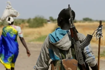 An armed man close to the village of Nialdhiu, South Sudan, Feb. 7, 2017. Siegfried Modola/Reuters