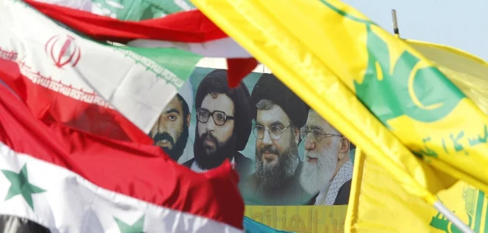 A poster of Iran's Supreme Leader Ayatollah Ali Khamenei, Hezbollah Secretary-General Sayyed Hassan Nasrallah, former Hezbollah Secretary-General Sayyed Abbas Al-Musawi and Lebanese resistance leader and cleric Sheikh Ragheb Harb, in Bint Jbeil, Lebanon, May 25, 2014. Ali Hashisho/Reuters