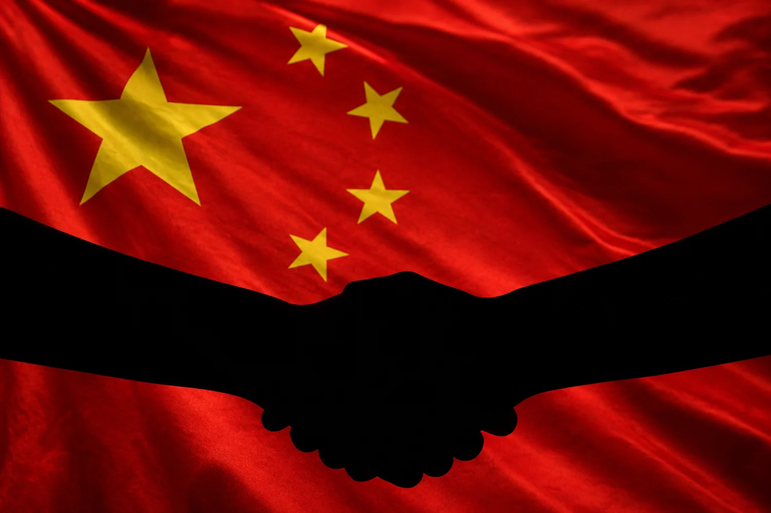 A silhouette of two hands shaking over the background of the Chinese flag.